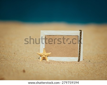 wooden picture frame on the beach