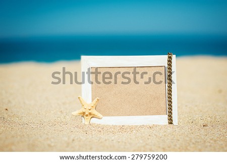 wooden picture frame on the beach
