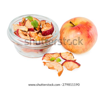 Dried and fresh apples on white background