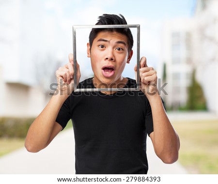 young man with a frame