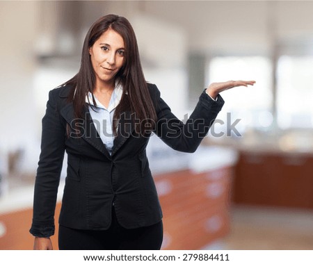 cool business-woman holding something