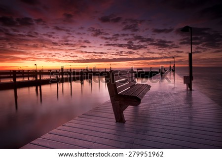 Dramatic sunrise. Sayville docks and marina. Long Island, New York .Atlantic ocean.  