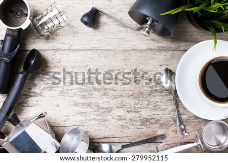 Copyspace frame with gardening tools and objects on old wooden background