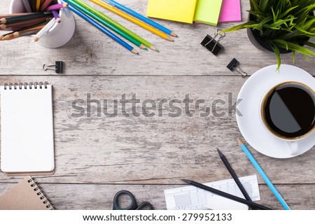 Copyspace frame with gardening tools and objects on old wooden background