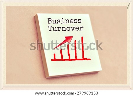 Text business turnover on the graph goes up on the short note texture background
