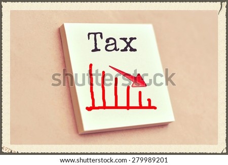 Text tax on the graph goes down on the short note texture background