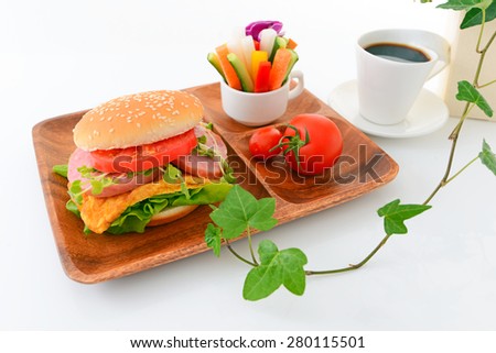 Delicious hamburger with coffee