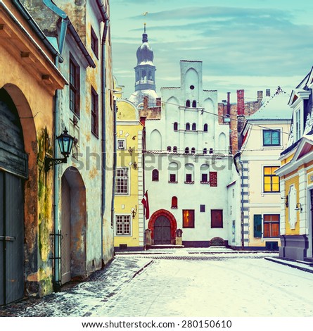 Medieval street in the center of old Riga city, Latvia. Image toned for inspiration of warm vintage effect
