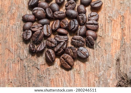 Coffee on old wooden background