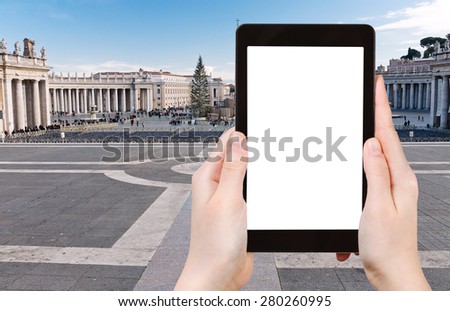 travel concept - tourist photograph St.Peter Square in Vatican, Rome, Italy on tablet pc with cut out screen with blank place for advertising logo