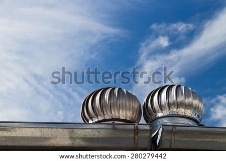 Roof Ventilation on blue sky and cloud background Royalty-Free Stock Photo #280279442