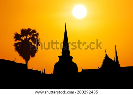 silhouette Wat Phra Mahathat Woramahawihan at Nakon Si Thammarat in Thailand sunset background,Public place