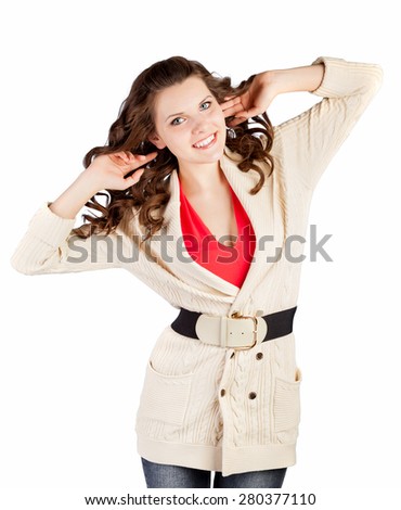 Young brunette woman is posing. Studio shot. Isolated on white background