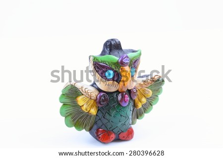 One resin owl doll isolated on white background