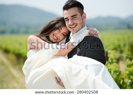 wedding day of a cheerful married young couple bride and groom Royalty-Free Stock Photo #280402508