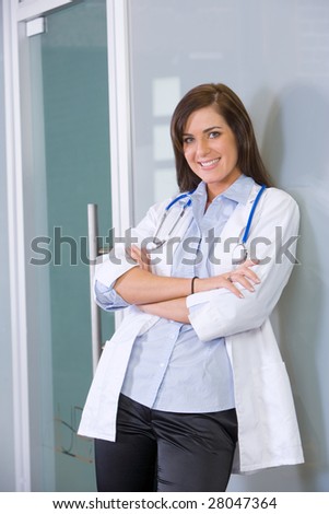 Female doctor arms crossed in a modern office