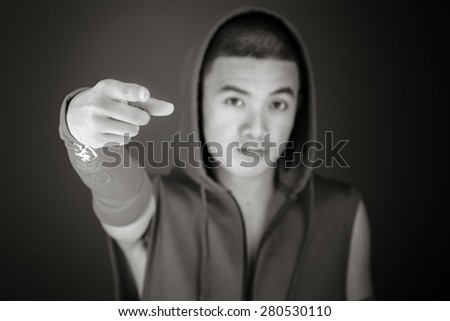 model isolated on plain background nagging scolding with finger