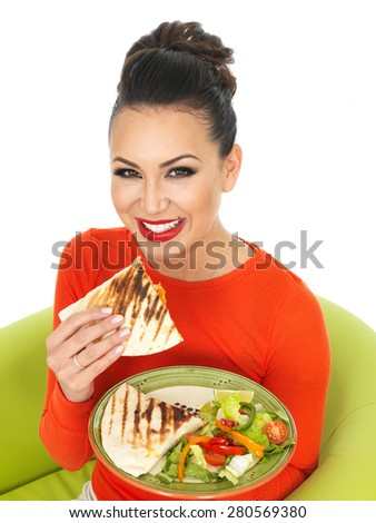Beautiful Happy Young Hispanic Woman In A Bright Red Jumper With a Plate of Mexican Chicken Quesadula and Salad