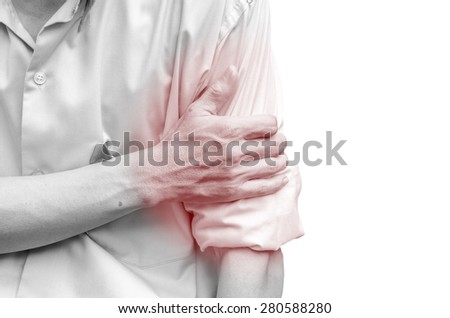 Young attractive business man having shoulder pain, isolated on white background, monochrome photo with red as a symbol for the hardening