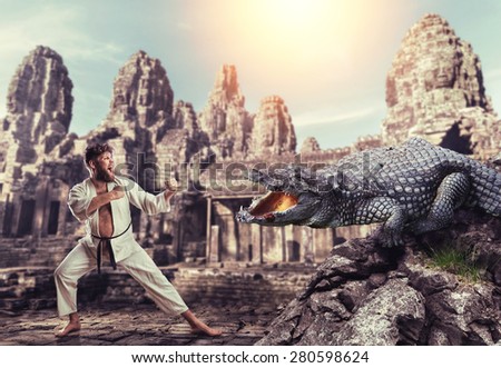 Karateka fights with crocodile