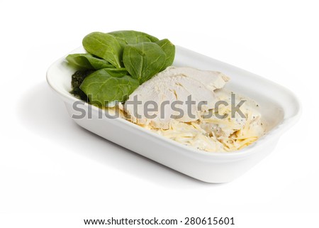 Ham, cheese and spinach in a bowl on a white isolated background