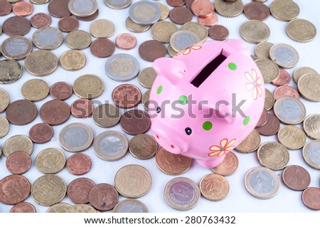 Picture of a Business Money Concept Idea Coins and Piggy Bank