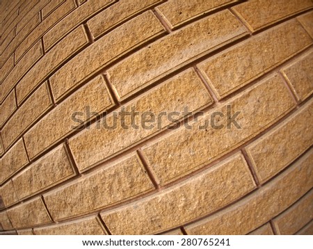 Fragment of decorative brown wall with wide angle distortion view