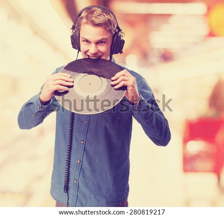 cool young-man with vinyl