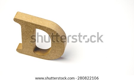 Single capital letter D wooden block. Isolated over the white background. Slightly defocused and close up shot. Copy space.