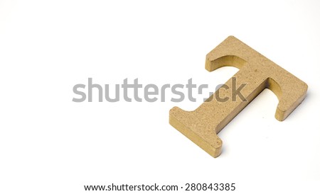 Single alphabet capital letter T wooden block. Isolated over the white background. Slightly defocused and close up shot. Copy space.