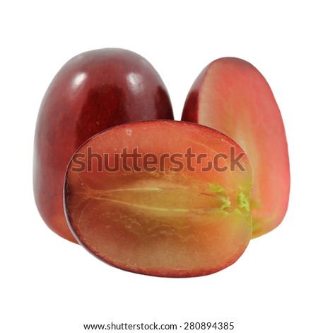 Close Up of Red grape sliced in a half isolated on a white background.