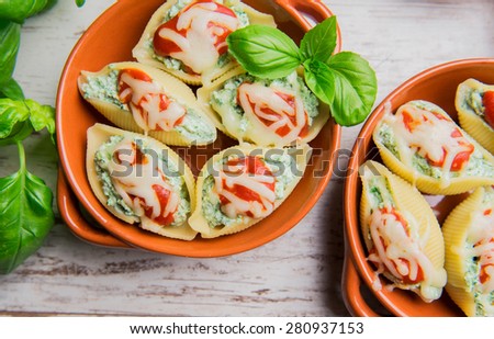 Pasta shells stuffed with ricotta cheese and spinach