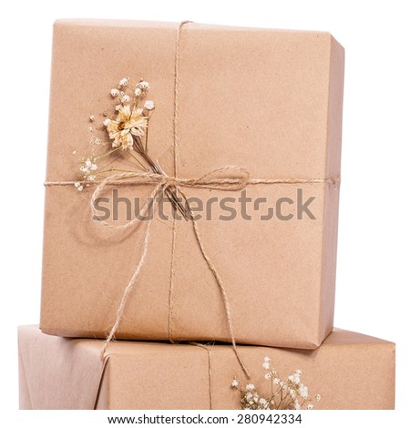 kraft paper gift box ribbon bow Isolated on white background