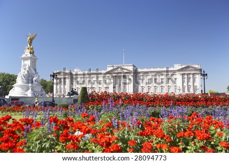Buckingham Palace With Flowers Blooming In The Queen's Garden, London, England
