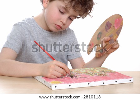 Young  artist is painting a picture