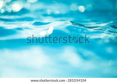 Bokeh light background in the pool. Royalty-Free Stock Photo #281034104
