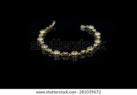 Jewelry accessories - bracelet with sapphire on a black background