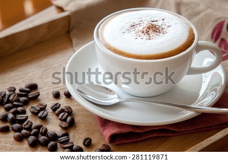 Coffee cup of cappuccino Royalty-Free Stock Photo #281119871