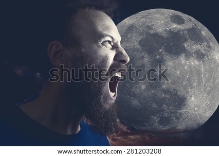 Picture of a bearded man screaming at the moon in moonlight.