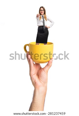 Woman inside cup opf coffee