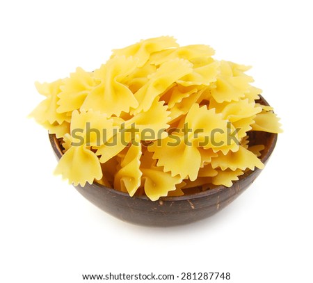 Dry noodle in wooden bowl on white background 