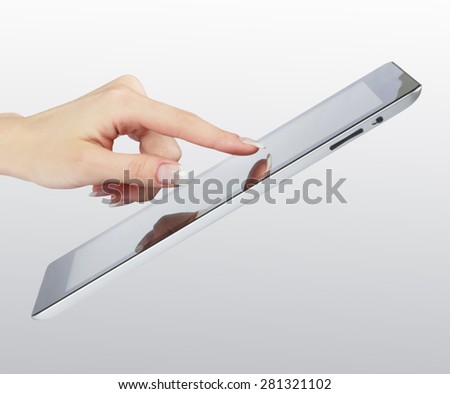 woman hand point on modern electronic digital frame with blank screen