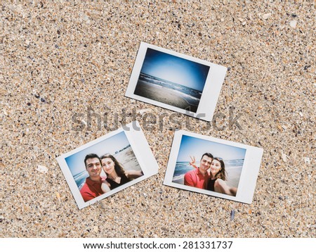 Instant Photos Of Young Couple On The Beach