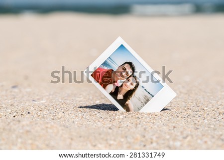 Instant Photo Of Young Happy Boyfriend And Girlfriend Lovers On The Beach