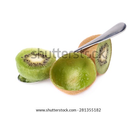 Eating kiwifruit chinese gooseberry kiwi with a teaspoon, composition isolated over the white background