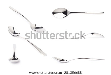 Stainless steel glossy metal kitchen spoon isolated over the white background, set of multiple different foreshortenings Royalty-Free Stock Photo #281356688