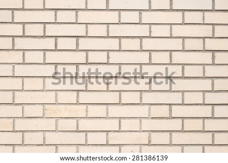 creamy color brick wall texture as background, close up, horizontal