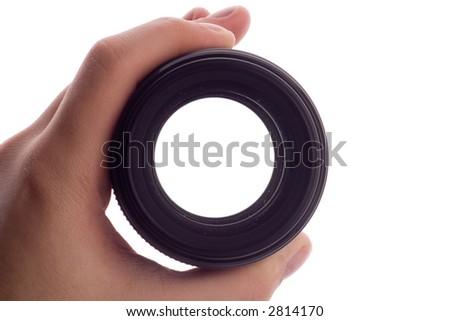 Hand holding a lens
