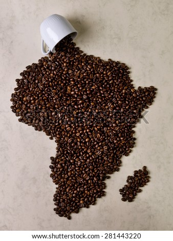 Fall cup coffee, coffee beans forming the map of Africa