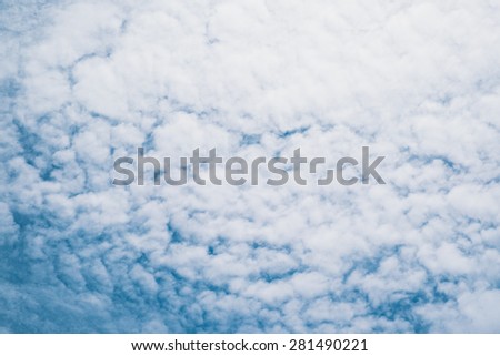 Abstract White clouds on a blue sky background Royalty-Free Stock Photo #281490221